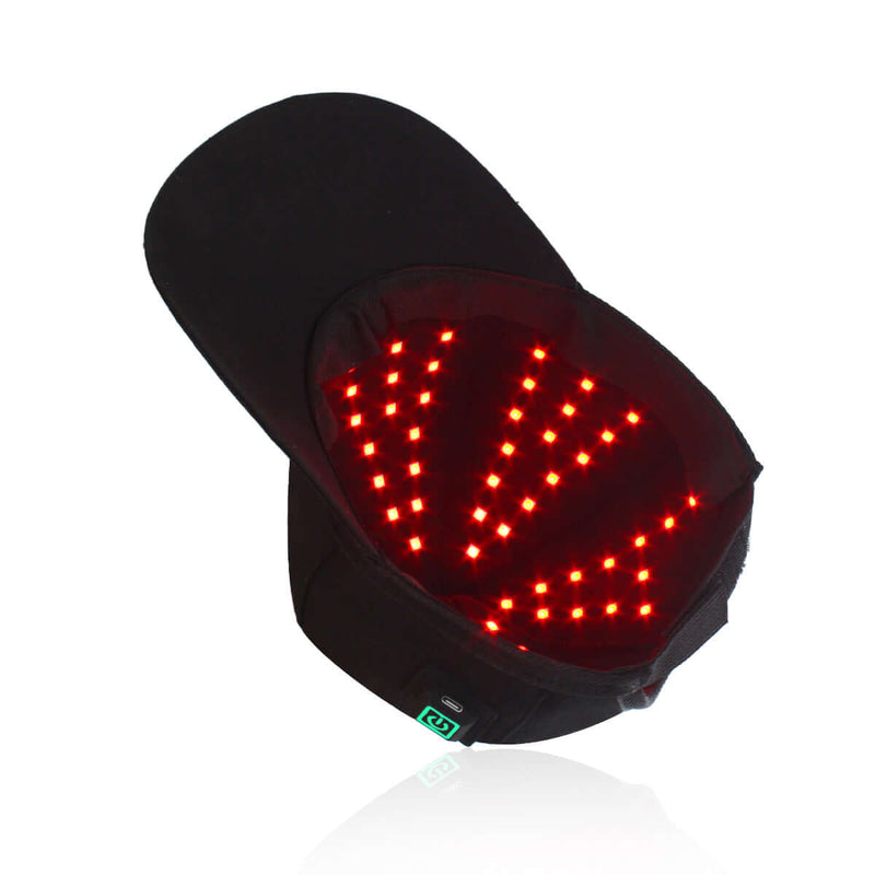 Red light therapy hat for hair regrowth with bright red LEDs designed for hair growth and circulation.